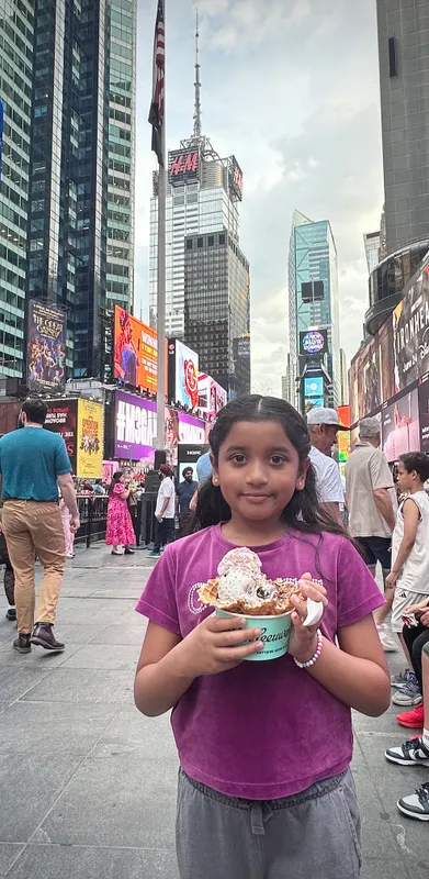 Ice cream store - Van Leeuwen Ice Cream, ice cream flavor- strawberry + vanilla + cookies & cream in waffle cup. Place - Times Square, NYC
